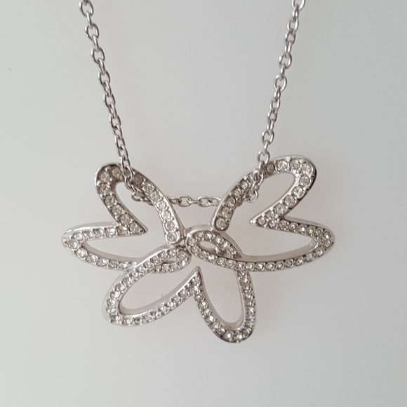 Swarovski Jewelry - Swarovski triple heart necklace rhodium plated